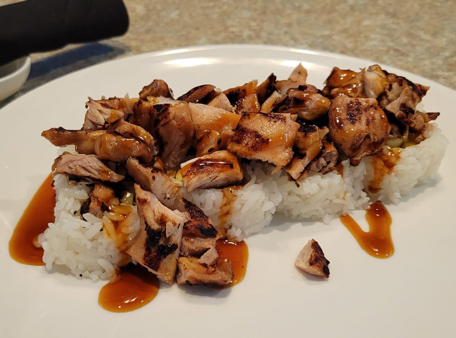 Inside: chicken teriyaki, cucumber and avocado
Outside: chopped chicken teriyaki drizzled with our very own teriyaki sauce