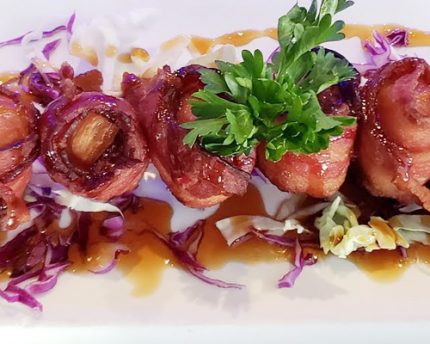 6 bacon wrapped scallops, baked and drenched with teriyaki sauce