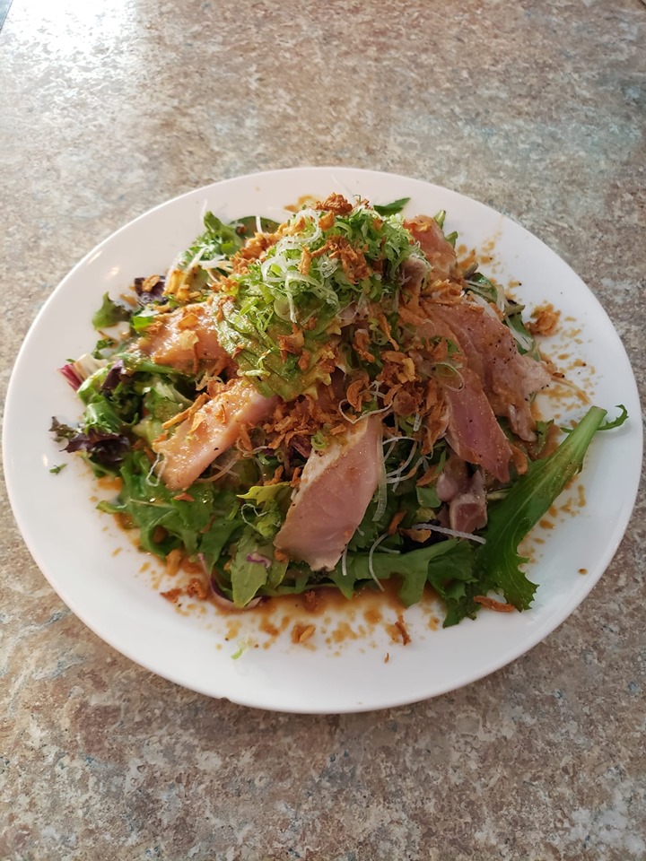Chef's Favorite Seared Albacore Salad Go Fish Sushi Bar - Simi Valley, CA Mixed greens, cucumber, avocado, seared albacore, drizzled with garlic sauce dressing and crispy onions!
Each of our salads are served with their very own unique dressings!