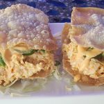 2 pieces of a spicy crab mix, with avocado inside a crispy wonton shell, topped with a spicy mayo sauce and a sliced jalapeno