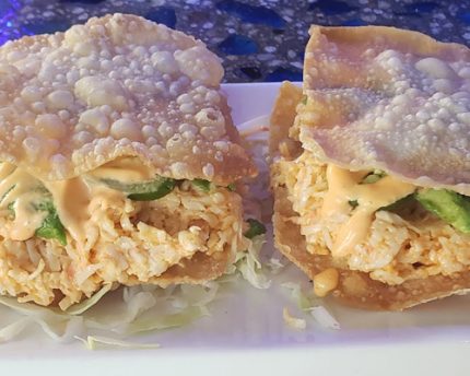 2 pieces of a spicy crab mix, with avocado inside a crispy wonton shell, topped with a spicy mayo sauce and a sliced jalapeno