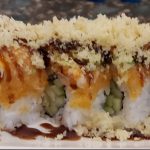 Inside: shrimp tempura and cucumber
Outside: crunchy shrimp and avocado, drizzled with sweet sauce and chilly oil