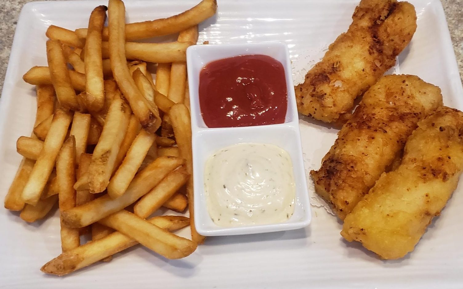 Fish & Chips Go Fish Sushi Bar - Simi Valley, CA Beer battered North Atlantic Cod with french fries and tarter sauce.