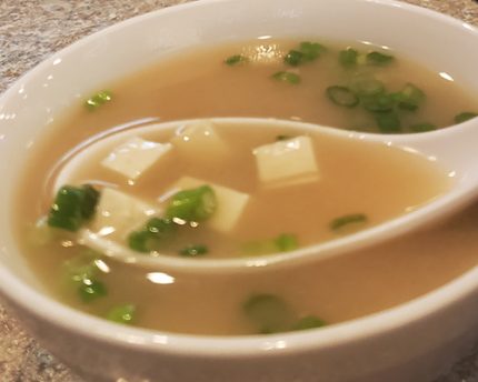 Served with fresh tofu and sliced green onion