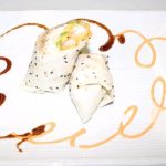 Inside: shrimp tempura, crab meat and avocado
Outside: wrapped in soy paper drizzled with sweet sauce and spicy mayo