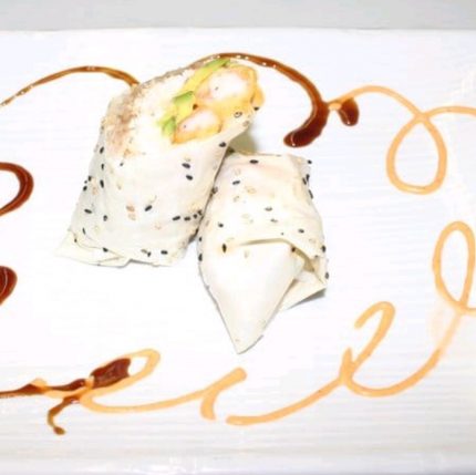 Inside: shrimp tempura, crab meat and avocado
Outside: wrapped in soy paper drizzled with sweet sauce and spicy mayo