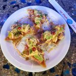 A spicy fish blend on top of crispy wonton chips