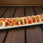 Inside: shrimp tempura, spicy tuna and cucumber
Outside: fresh tuna and avocado drizzled with spicy sauce