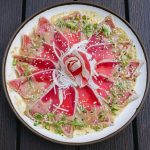 12 pc thinly sliced tuna in a chef special garlic sauce