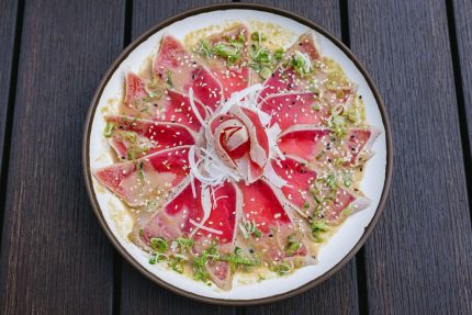 12 pc thinly sliced tuna in a chef special garlic sauce