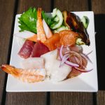 This bright, fresh dish includes assorted sashimi, Oba leaf, and cucumber, all on top of a fluffy bed of sushi rice.