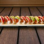 Inside: spicy tuna and cucumber
Outside: fresh tuna and avocado drizzled with a spicy mayo and Ichi sauce