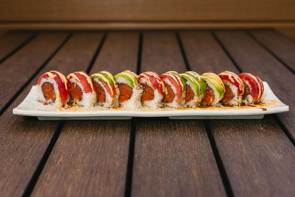 Dragon Roll Go Fish Sushi Bar - Simi Valley, CA Inside: spicy tuna and cucumber
Outside: fresh tuna and avocado drizzled with a spicy mayo and Ichi sauce