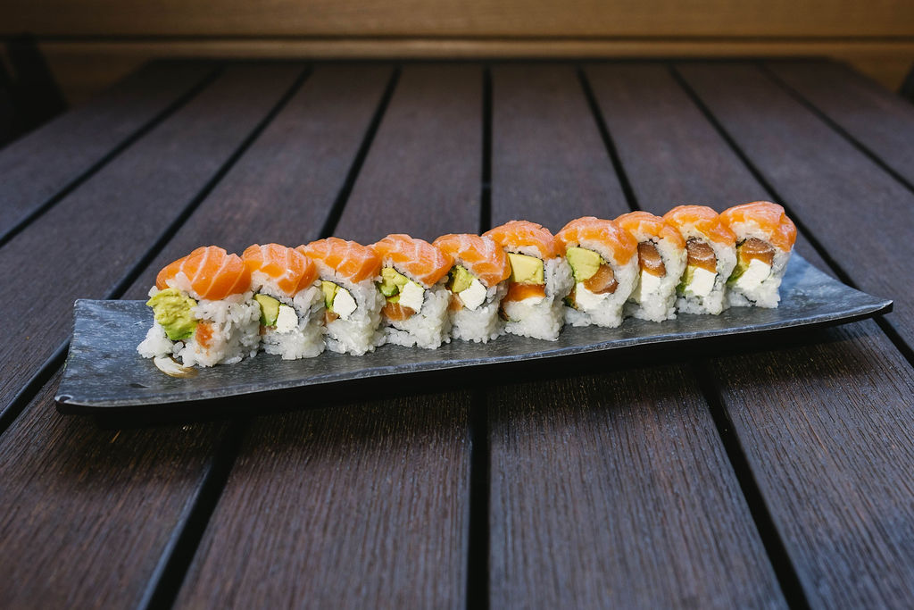 Philadelphia Roll Go Fish Sushi Bar - Simi Valley, CA Inside: fresh salmon, cream cheese, and avocado
Outside: fresh salmon