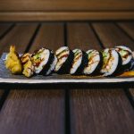 Inside: salmon tempura, avocado and cucumber
Outside: crunch flakes with sweet sauce