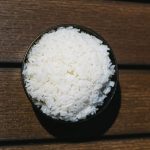 A bowl of steamed white rice served fresh and hot