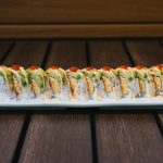 Inside: spicy shrimp and spicy crab Outside: avocado drizzled with spicy sauce