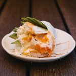 A delicious blend of scallops, shrimp, crab meat, avocado, gobo root and tobico, mixed in a spicy cream sauce, wrapped in soy paper.